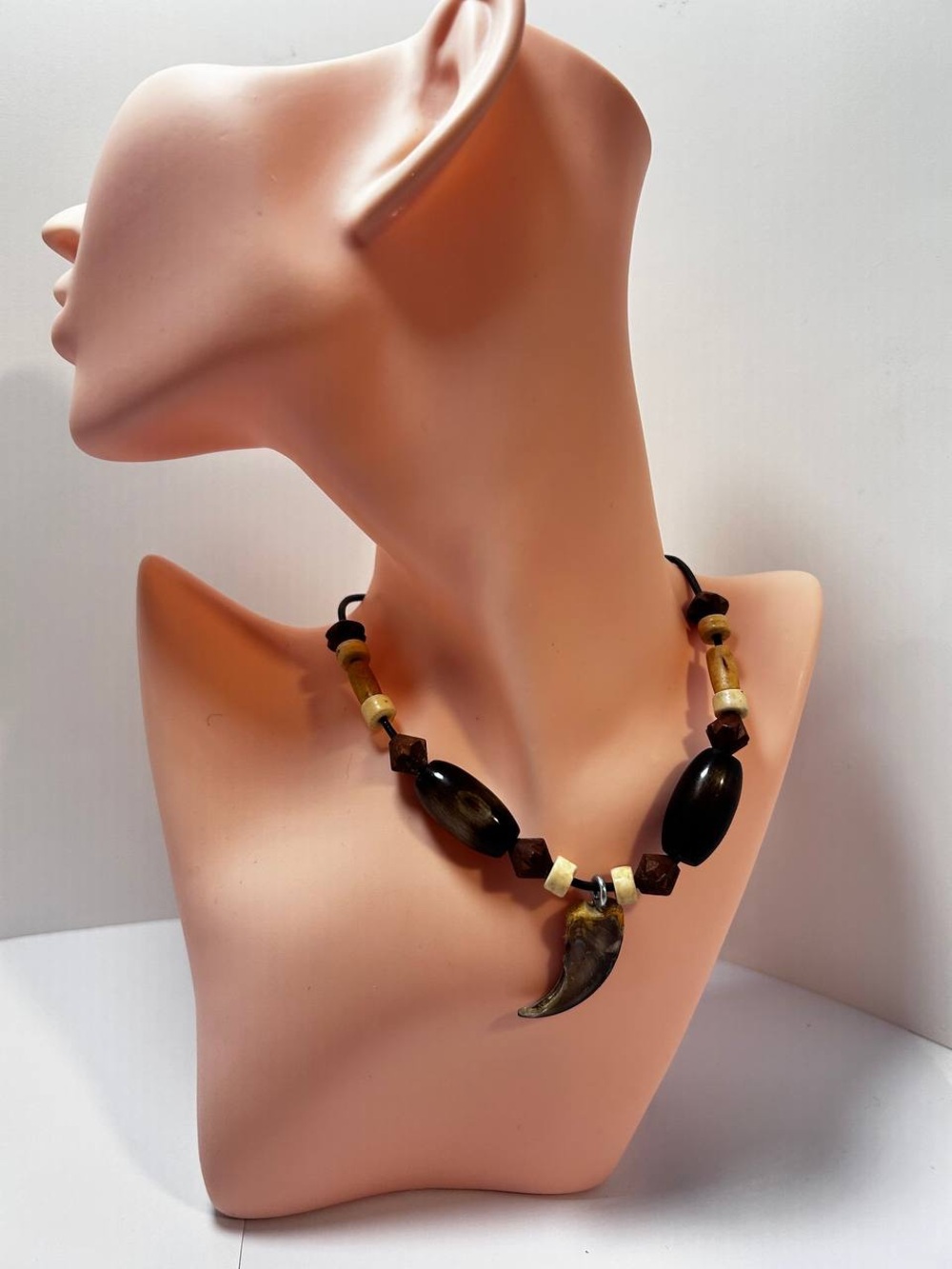 Handmade necklace amulet with claw